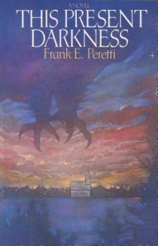 This Present Darkness – Paperback By Peretti, Frank – GOOD