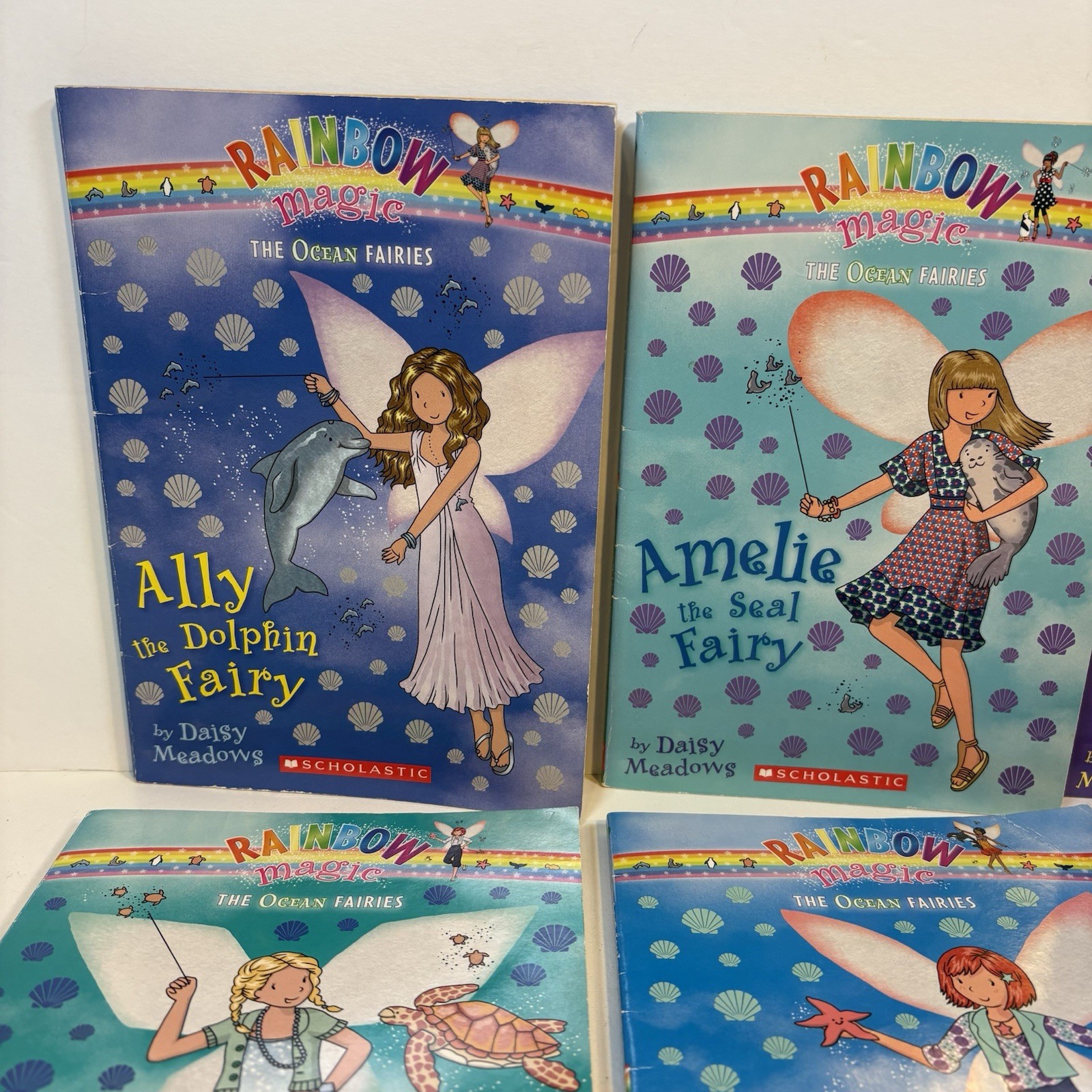 THE OCEAN FAIRIES RAINBOW MAGIC FAIRIES: Books 1-7 Set/Lot (by Daisy Meadows)