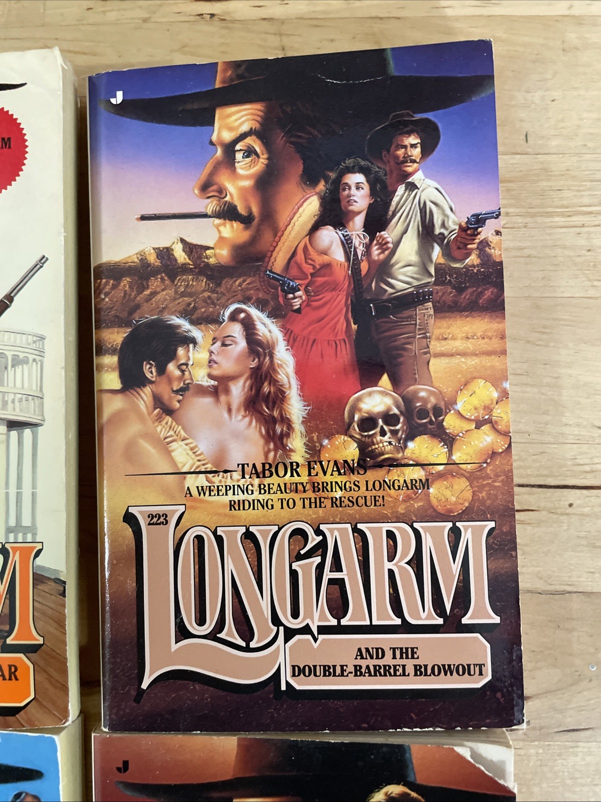 4 paperbacks by Tabor Evans – Longarm Novel + 105, 217 and 223