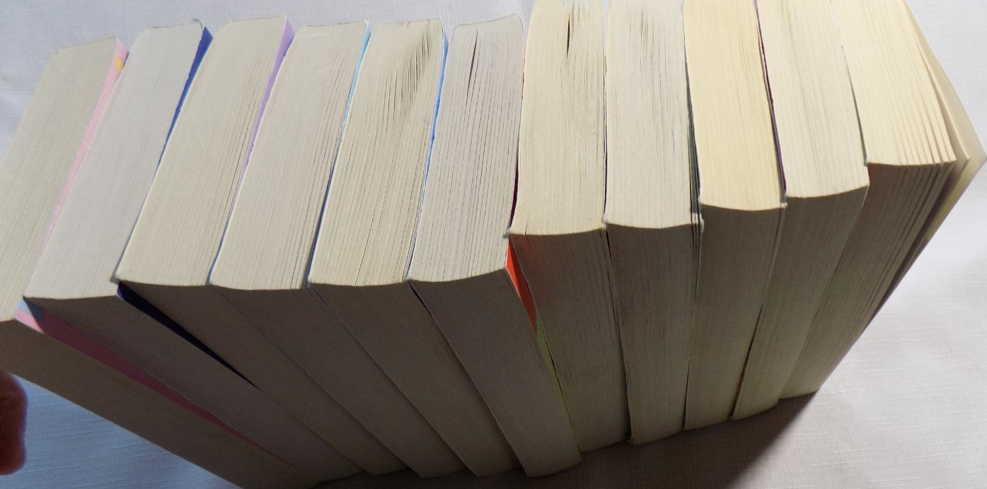Lot of 11 Paperback Books in the Magical Cats Mystery Series by Sofie Kelly