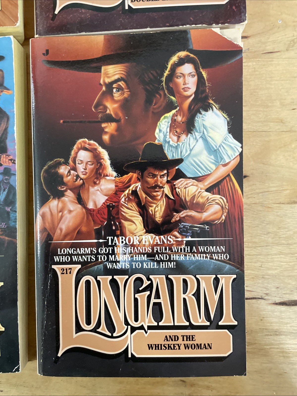 4 paperbacks by Tabor Evans – Longarm Novel + 105, 217 and 223