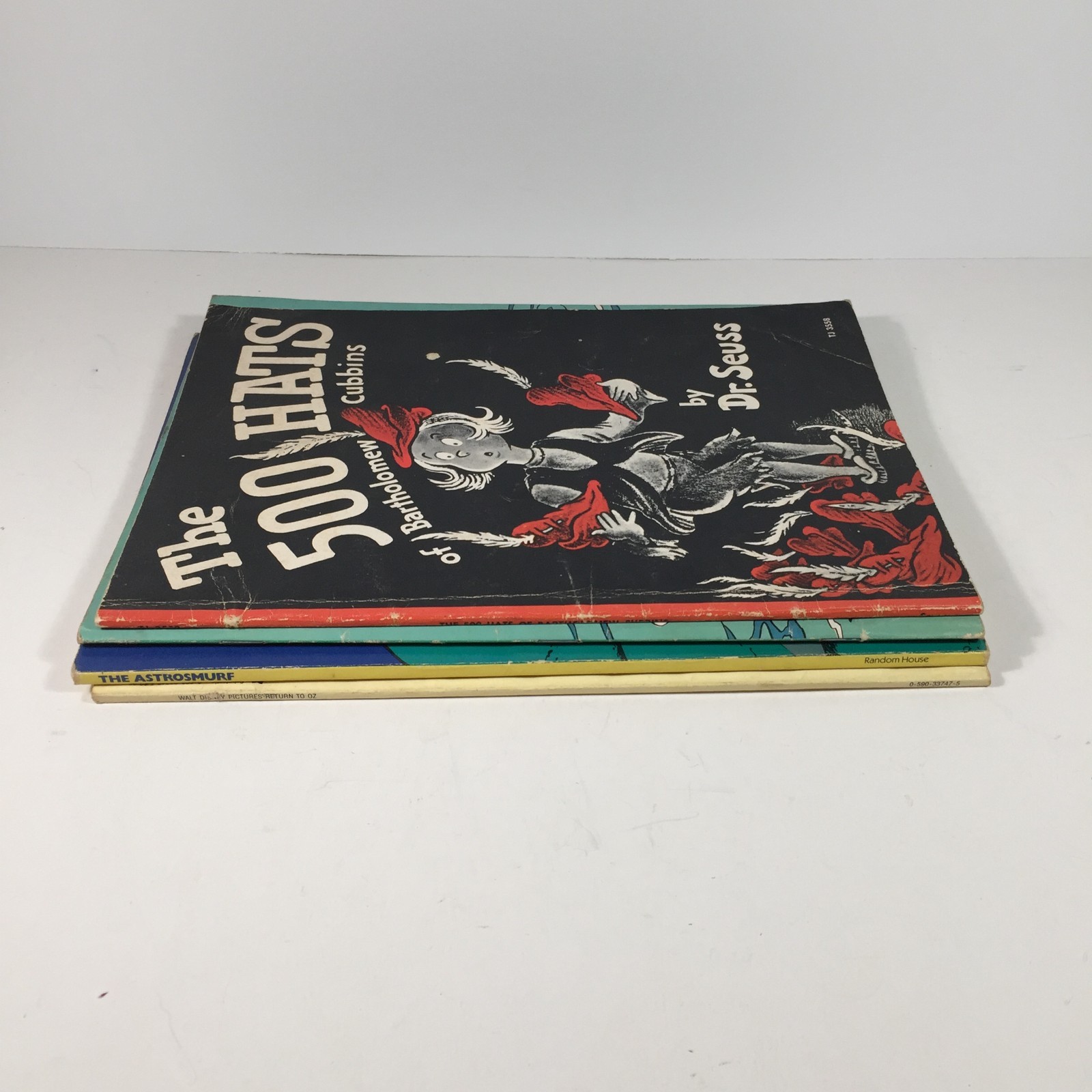 Lot of 4 Paperback Childrens Books-Dr. Seuss 500 Hats, Smurfs, Fox & Hound, Oz