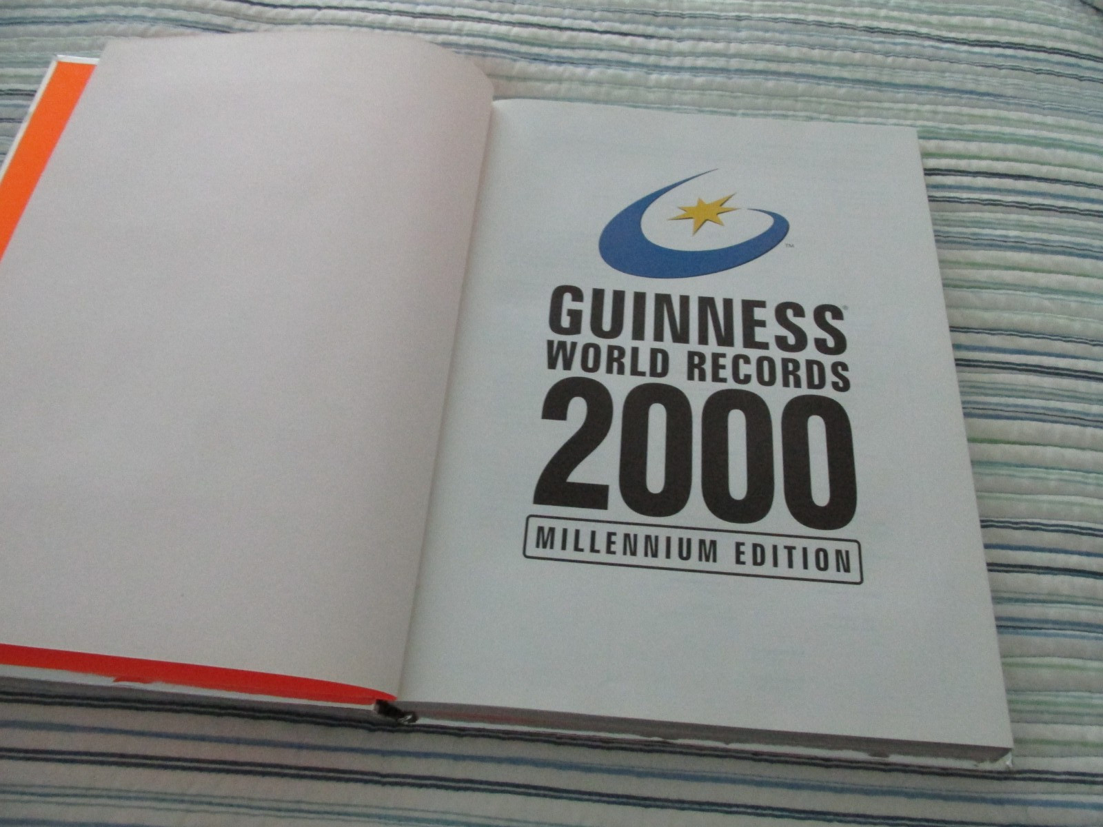 Vintage Guinness Book Of World Records 2000 Millennium Edition Silver Hard Cover