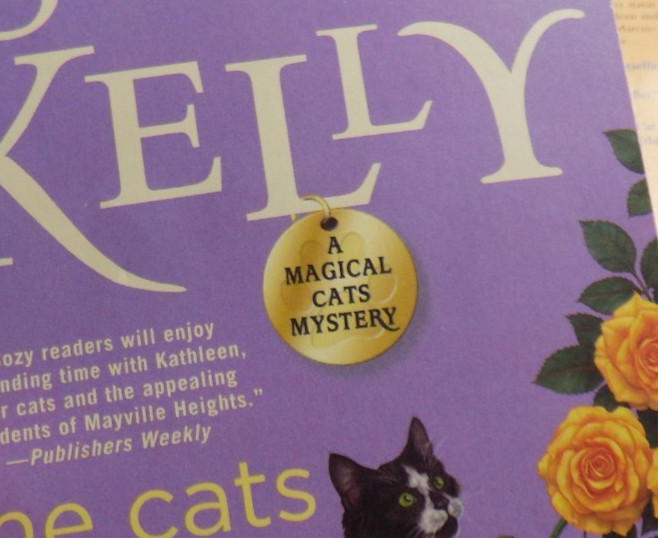 Lot of 11 Paperback Books in the Magical Cats Mystery Series by Sofie Kelly