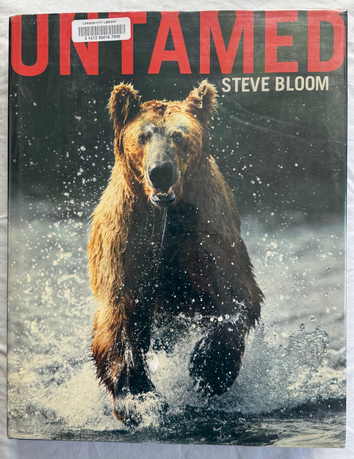 Untamed by Steve Bloom – WILD PHOTOS 2004 Hardcover, ex-library 14.6×11.6×1.5 in