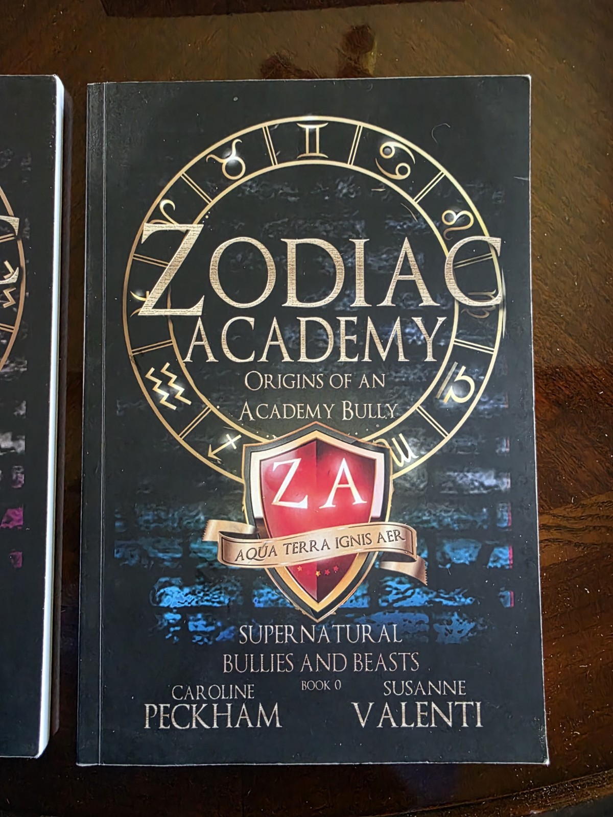 Zodiac Academy Books 0.5 And 5.5 In The Original Matte Black Covers.