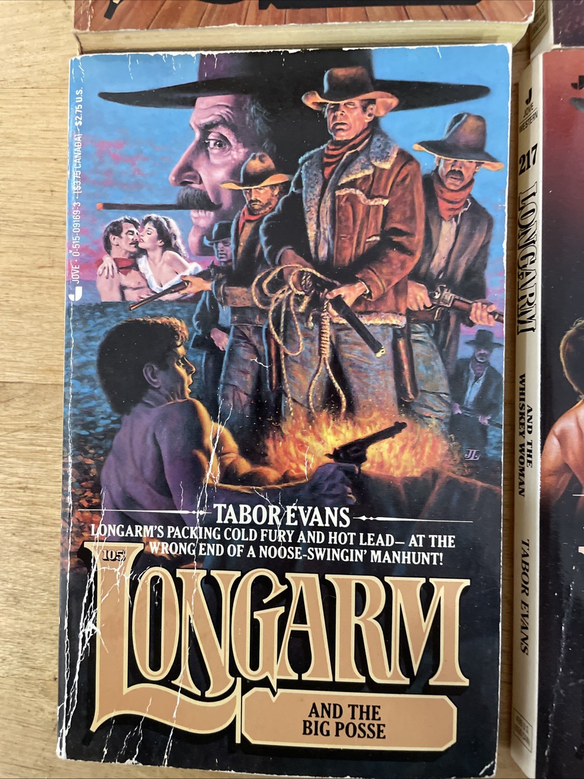 4 paperbacks by Tabor Evans – Longarm Novel + 105, 217 and 223