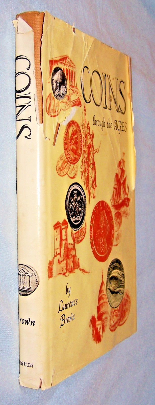 Coins Through the Ages HB w/tattered, torn dj-Laurence Brown-184 pages