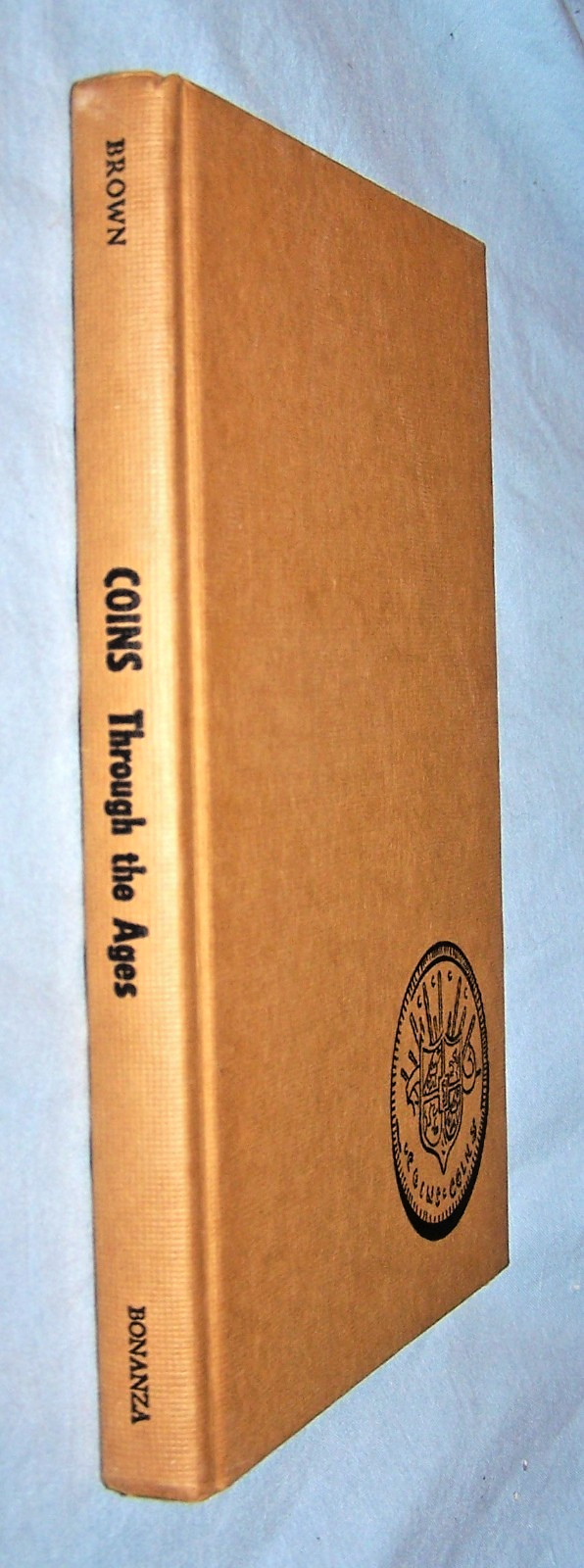 Coins Through the Ages HB w/tattered, torn dj-Laurence Brown-184 pages